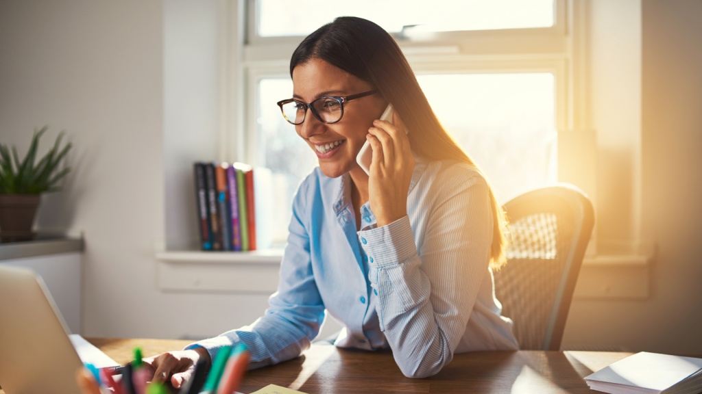 woman using a hosted phone system in Utah